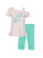 Completo Cerimonia a Pois Ativo Kids Completo da bambina in jersey di cotone composto da t.shirt stampata a maniche corte con bretella con parte posteriore leggermente più lunga + leggings basic con elastico in vita e rouche sul fondo.