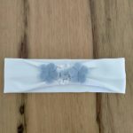 Fascia Liberty Fascia per neonata in jersey garzato con applicazioni di fiori in tessuto tinta unita e fantasia liberty. Made in Italy