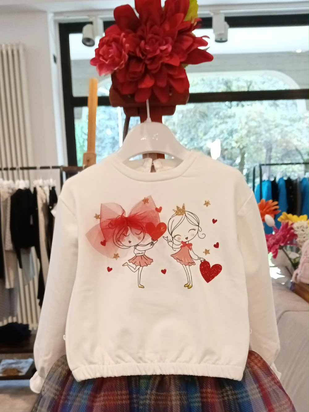 Felpa bimba UE1197 Party Natale 00 Felpa bimba Felpa bimba in cotone stretch, graziosa stampa con decoro glitter e fiocco in tulle. Made in Italy. Party Natale