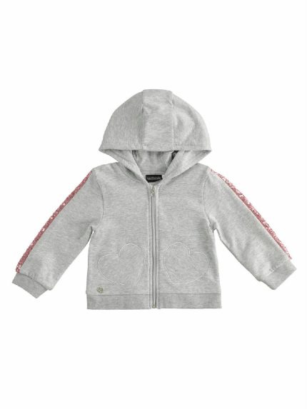 FELPA ZIPPATA EFFETTO GLITTER Felpa zippata bimba con cappuccio, in cotone effetto glitter, banda in paillettes sulle maniche, motivo a cuore applicato.