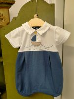 Pagliaccetto neonato Vela Pagliaccetto per neonato, modello bicolore con colletto fantasia e decoro con patch applicate. Made in Italy Lista Nascita Corredino