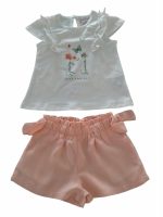 Shorts Fields Of Flowers Morbidissimi shorts in viscosa con cintura elastica, fiocchetti applicati in vita.