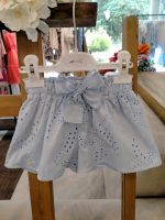 Shorts sangallo bimba Shorts in sangallo con cintura elastica e fiocco in vita.