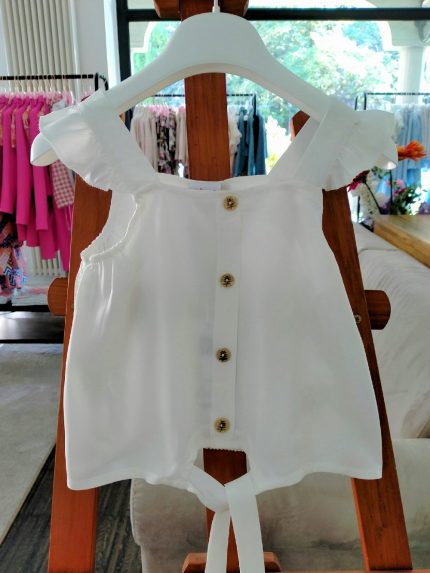 Top Top 100% viscosa con graziose spalline con volant applicati, finto cannoncino con decoro bottoni, fondo da annodare.