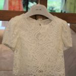 Top pizzo bimba Top in pizzo, fodera 100% cotone, con allacciatura posteriore con fiocco.