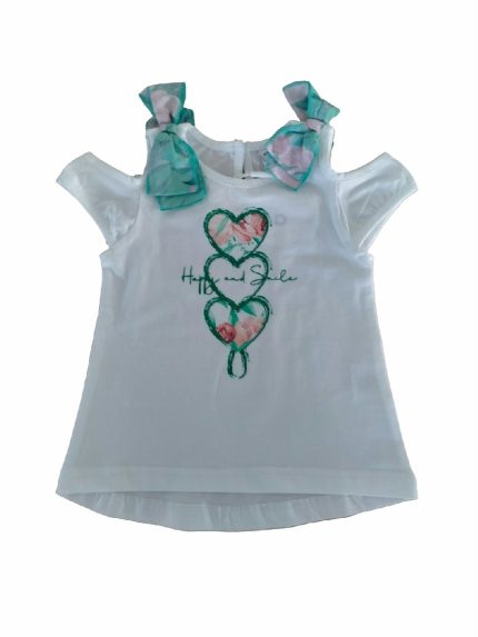 T.shirt m/c Cerimonia a Pois Ativo Kids T.shirt stampata per bambina a maniche corte scese con applicazione sulle spalle di fiocchi in tessuto fantasia a contrasto, dorso leggermente più lungo.
