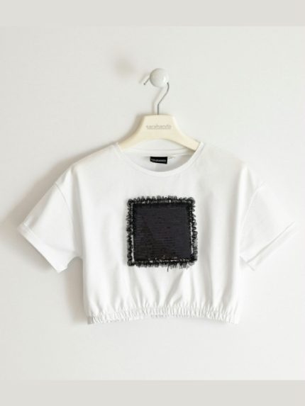 T.SHIRT M/CORTA CROP SARABANDA - T.shirt per ragazza a manica corta, modello crop, in jersey stretch con decoro paillettes.